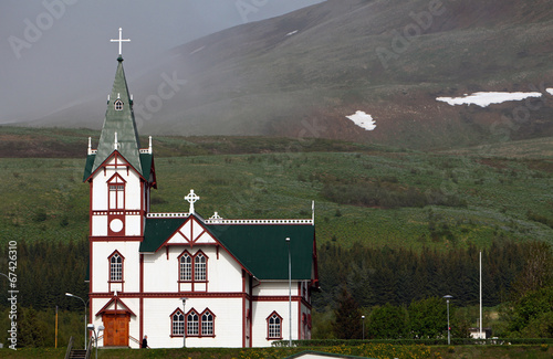 Fényképezés Husavik church at Husavik harbor, Iceland