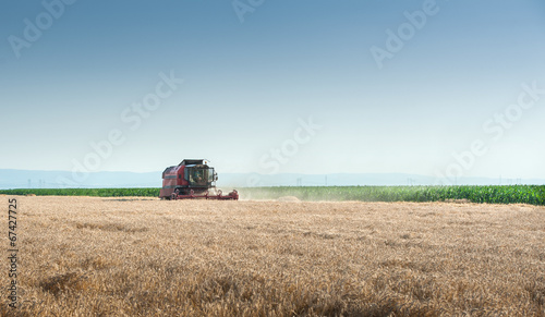 Working Harvesting Combine © Dusan Kostic