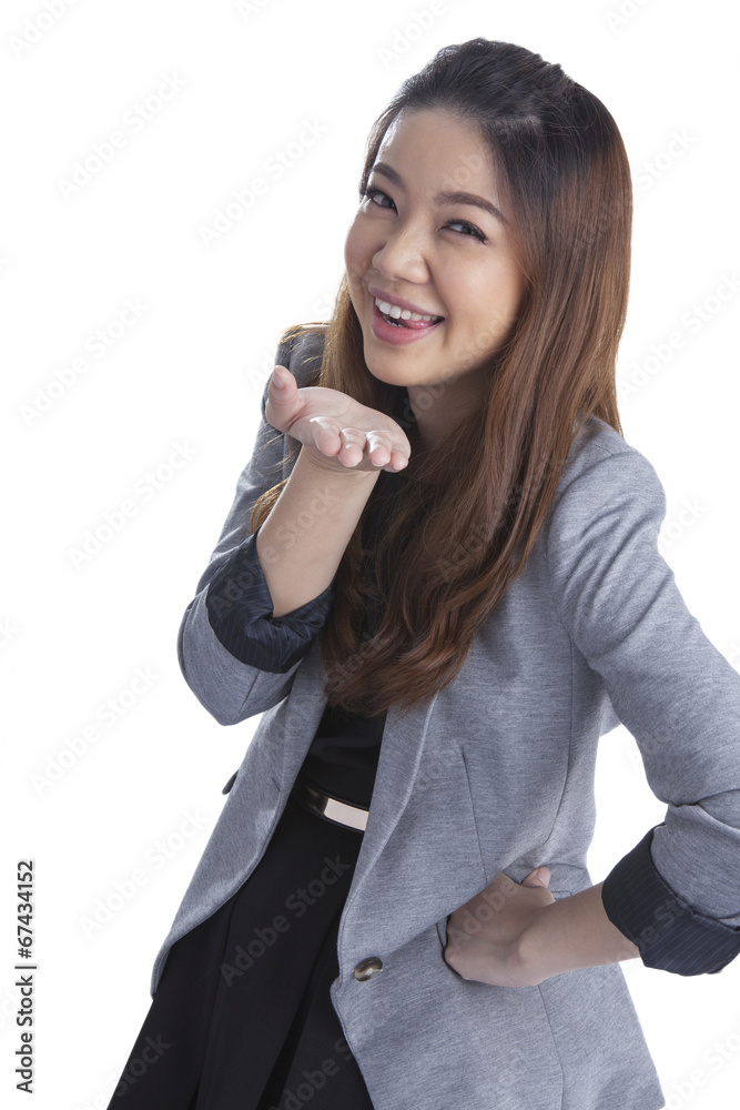 attractive businesswoman presenting something on the palm of her attractive businesswoman presenting something on the palm of her