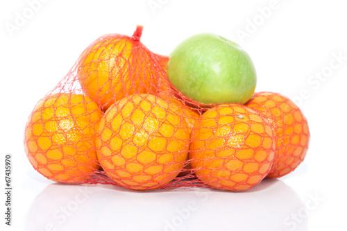The pile of oranges and apple