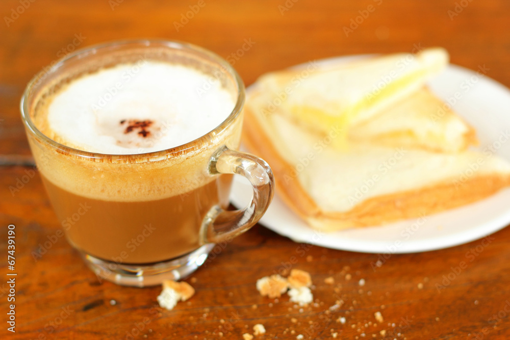 Bread and a cup of delicious coffee. Bread and a cup of delicious coffee.