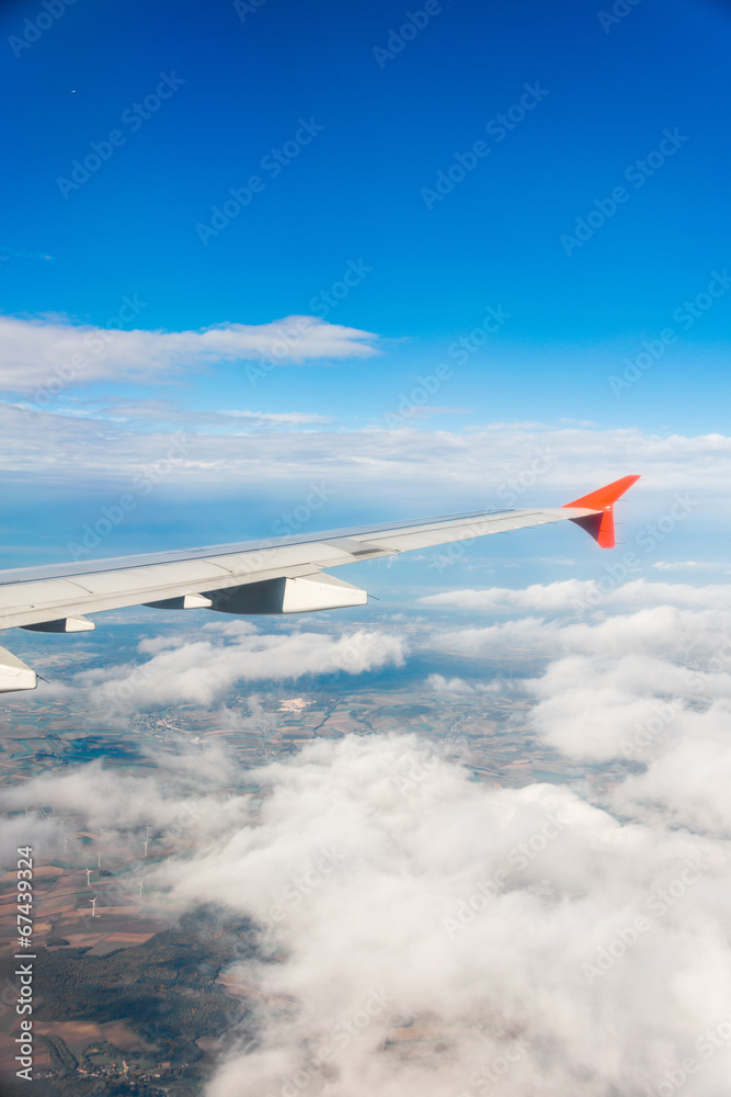 Airplane wing out of window Airplane wing out of window