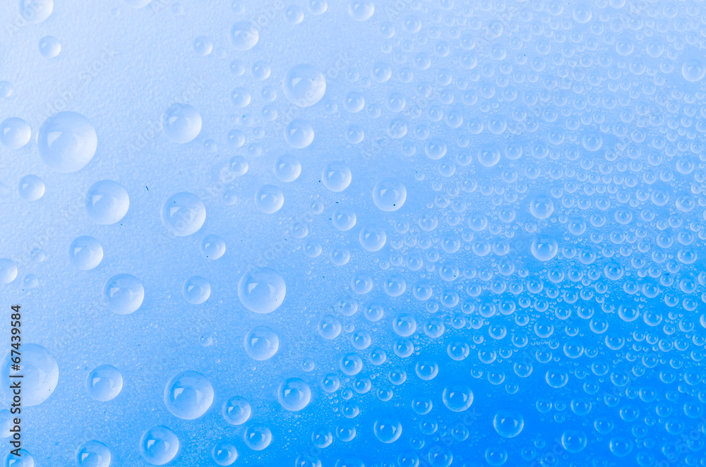 Water drop on color background