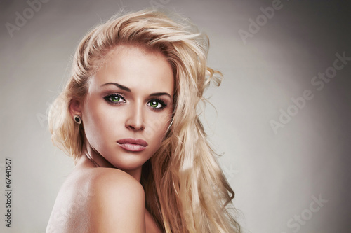 Fashion portrait of young beautiful woman.Sexy Blond girl