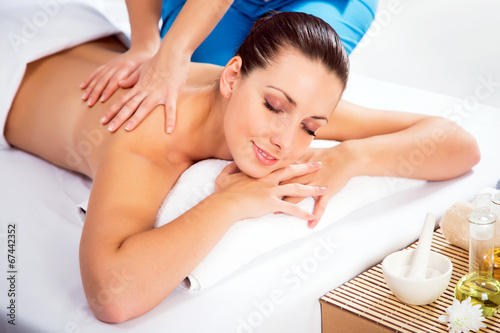 Woman on healthy massage of body