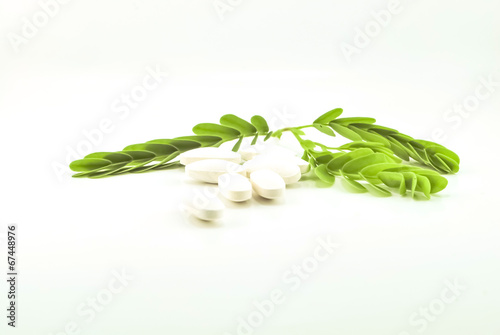 Stack of pills isolated on white background