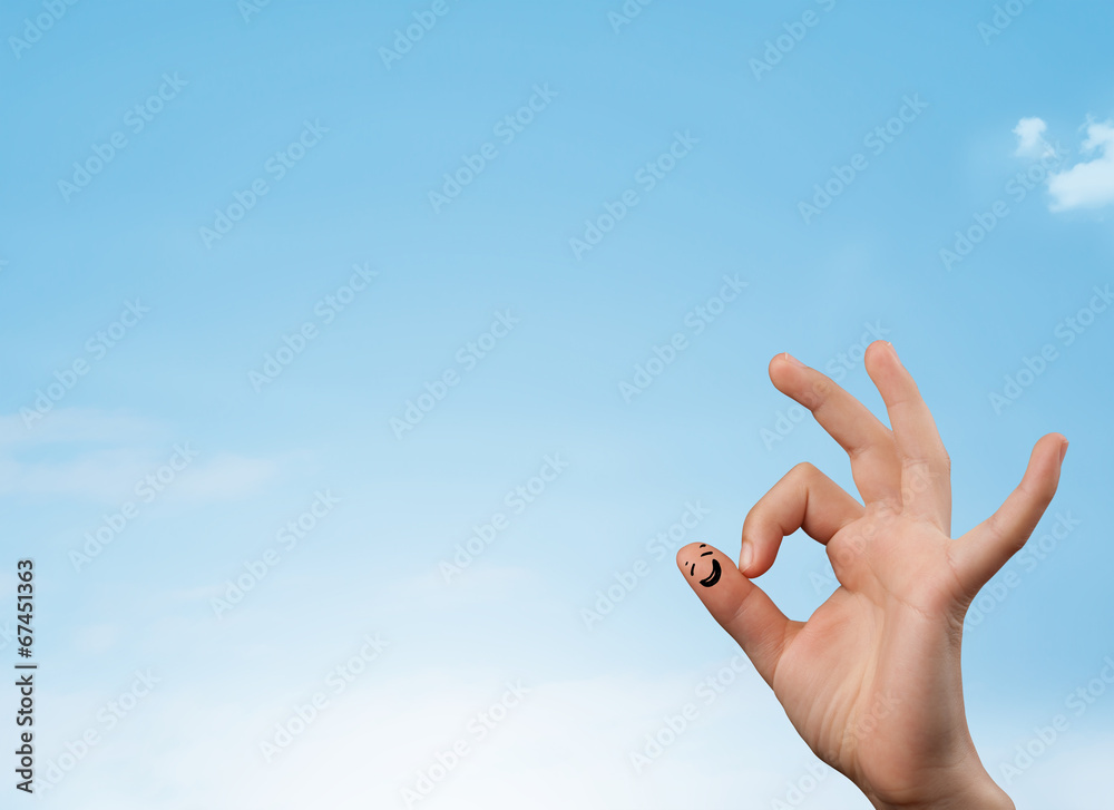 Happy smiley fingers looking at clear blue sky copyspace Happy smiley fingers looking at clear blue sky copyspace