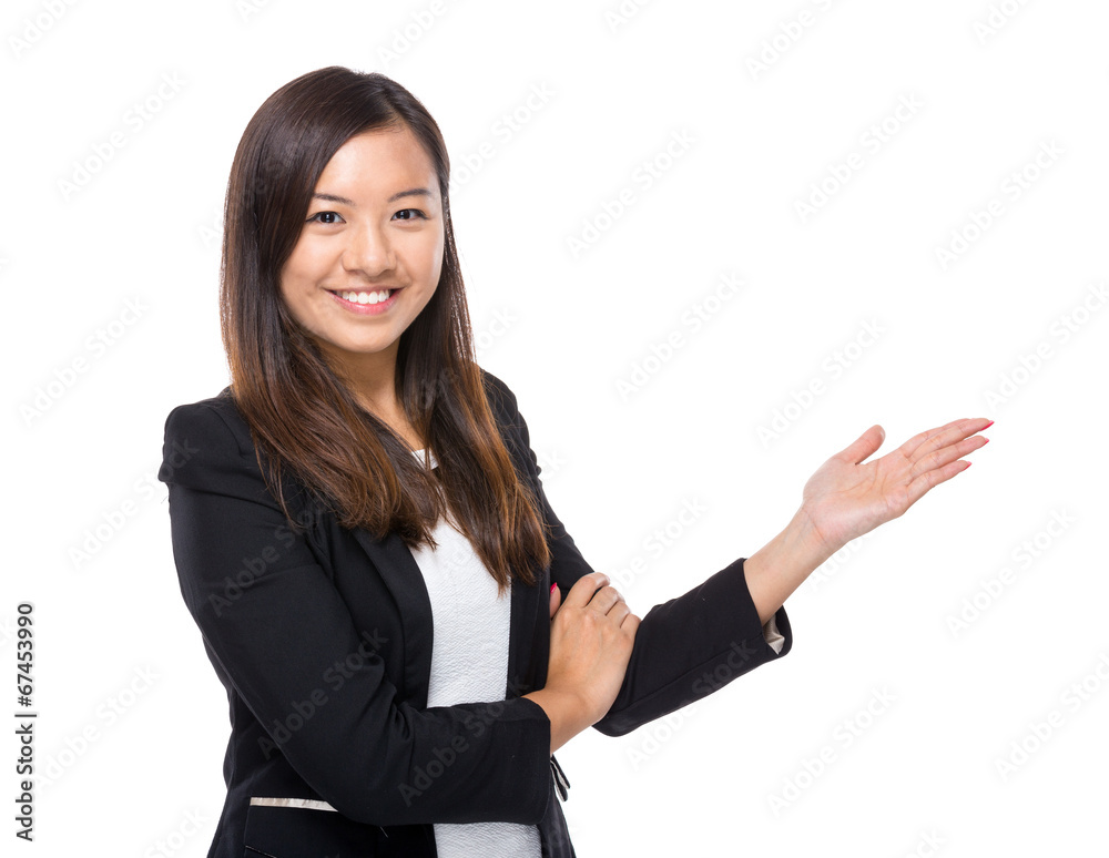 Asian business woman with hand presentation Asian business woman with hand presentation