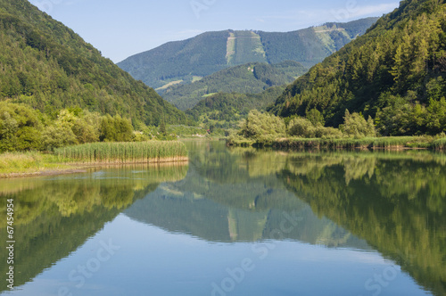 Mountain reflection in the Enns river in Upper Austria