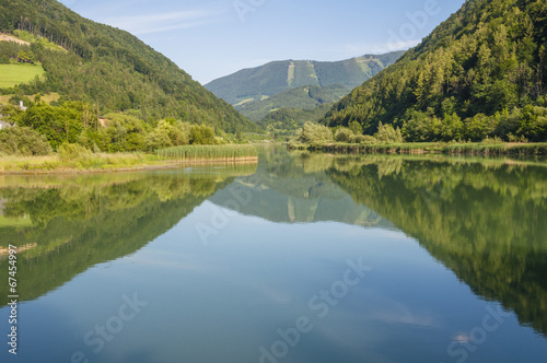 Mountain mirroring in the river Enns in Upper Austria