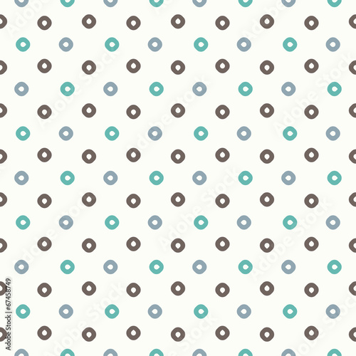 Seamless vector pattern or texture with colorful polka dots