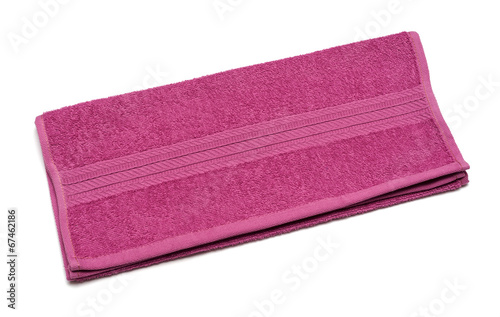 Folded terry towel isolated over the white background