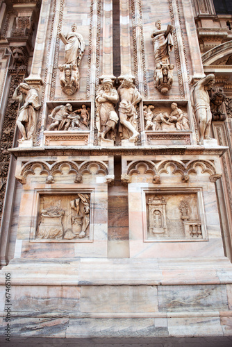 vintage antique facade with stone statues and ornaments