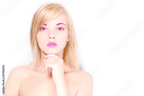 Obraz na płótnie woman blond hair on a white background with pink makeup w salonie