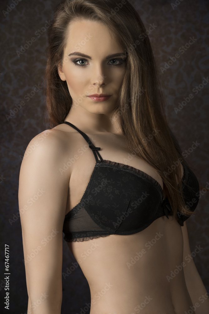 Fototapeta premium Young woman in black lingerie
