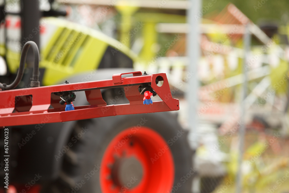 Obraz premium Tractor sprayer nozzle close-up