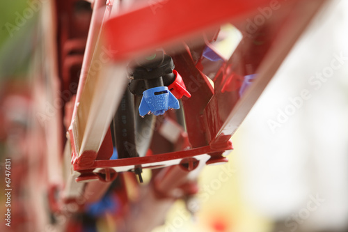 Tractor sprayer nozzle close-up photo