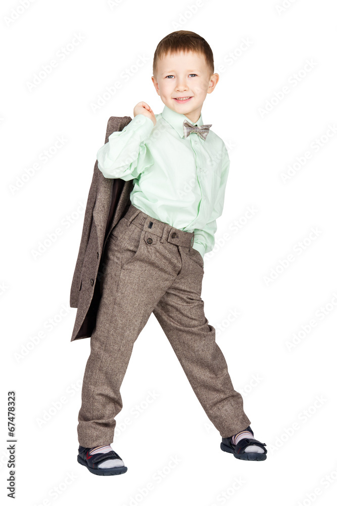 Young boy in grey suit and bow tie holding his jacket and lookin Young boy in grey suit and bow tie holding his jacket and lookin