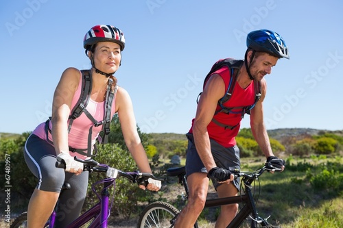 Active couple cycling in the countryside