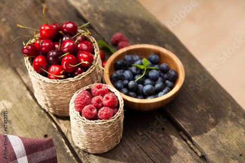 Fresh berries on a wooden table