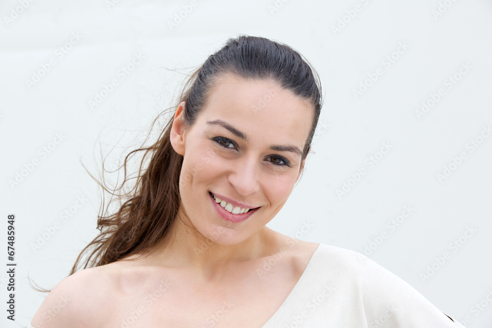 Young woman smiling on white background Young woman smiling on white background
