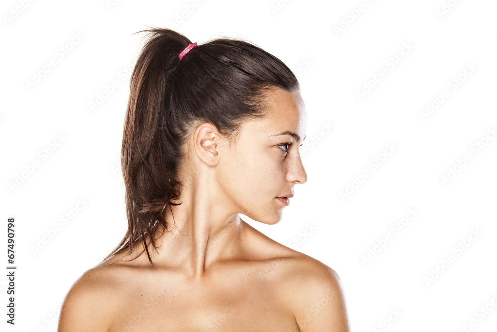 portrait of a young beautiful serious woman without make up portrait of a young beautiful serious woman without make up