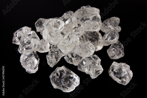 Beautiful Ice cubes. White crystals on a black background