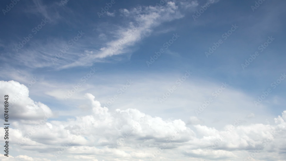 Time lapse clip of white fluffy clouds over blue sky Time lapse clip of white fluffy clouds over blue sky