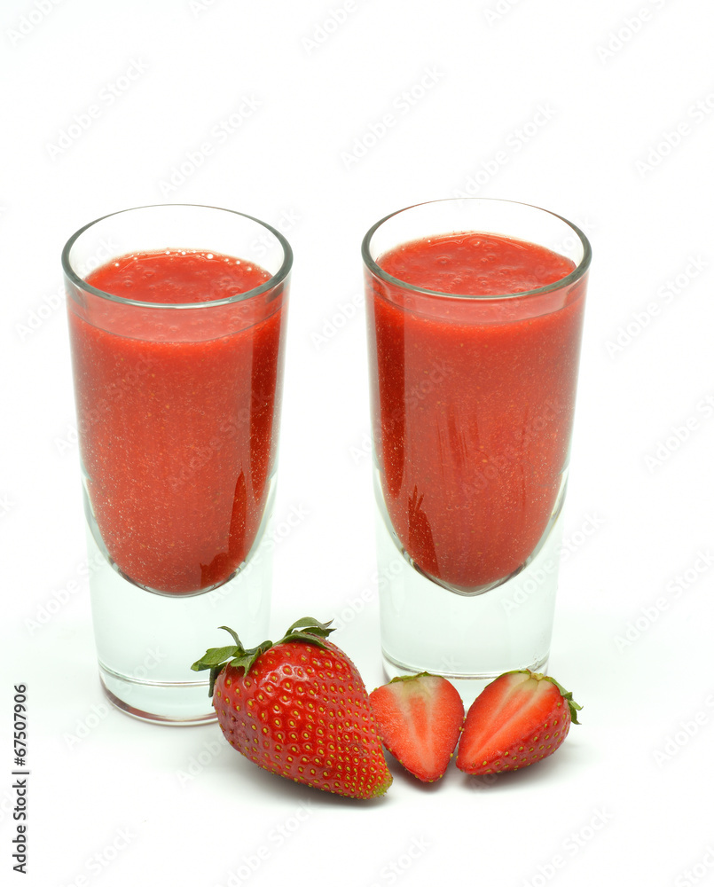 strawberry milkshake in two glasses isolated in white strawberry milkshake in two glasses isolated in white