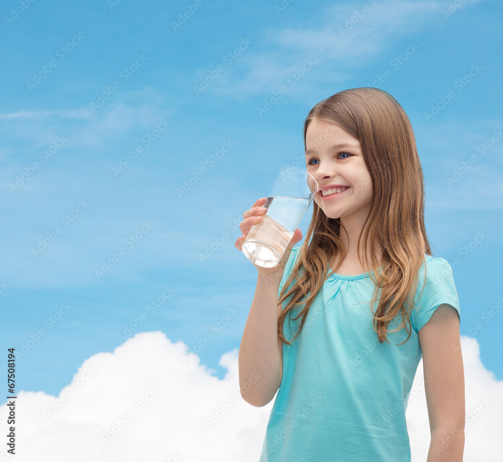 smiling little girl with glass of water smiling little girl with glass of water