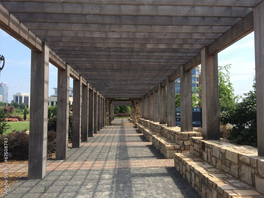 Covered walkway by a park