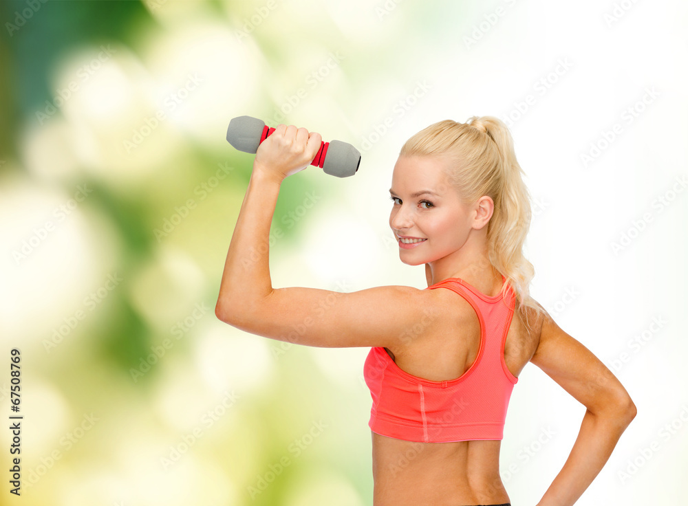 young sporty woman with light dumbbell young sporty woman with light dumbbell