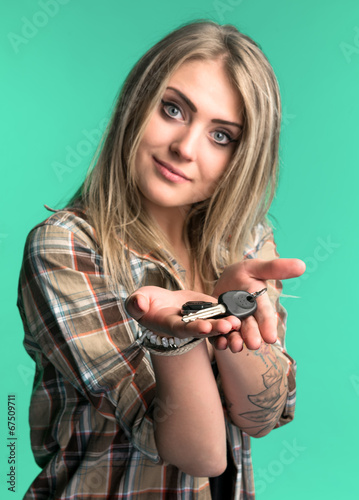 Woman with a car keys.