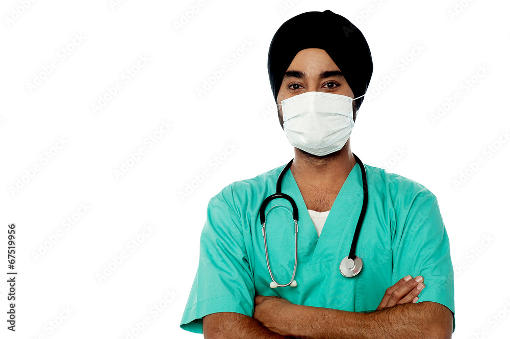 Young male doctor with face mask Young male doctor with face mask