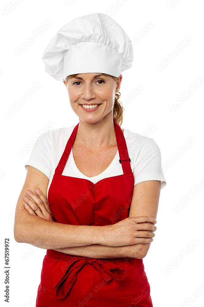 Female chef posing with folded arms Female chef posing with folded arms