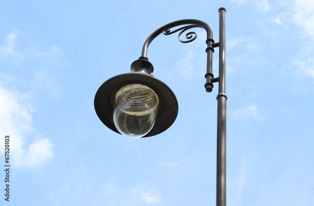 Park lamp on blue sky background Park lamp on blue sky background