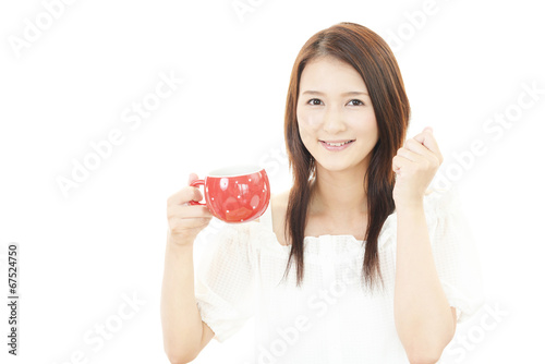 コーヒーを飲む笑顔の女性 © sunabesyou