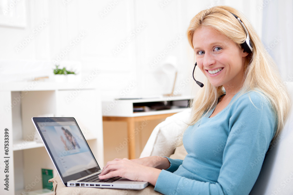 Young attractive woman blonde chatting on laptop Young attractive woman blonde chatting on laptop