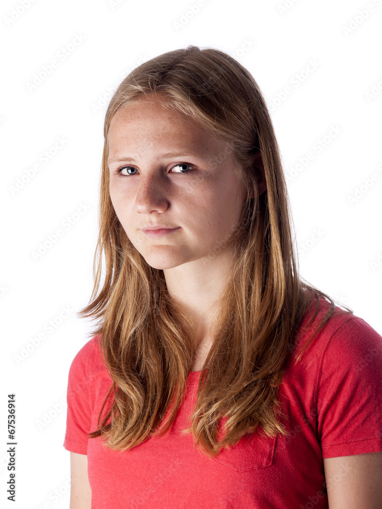 beautiful teenage girl looking seriously into the camera beautiful teenage girl looking seriously into the camera