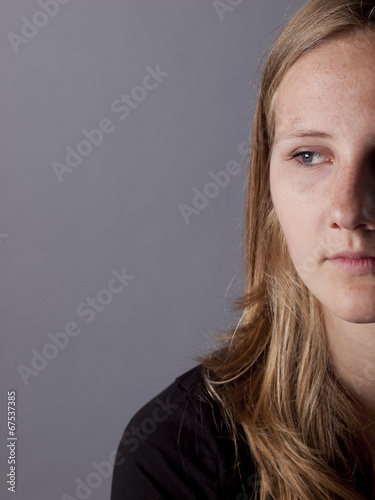 Young teenage girl looking sad or depressed