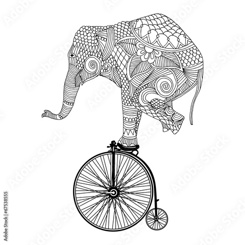 Elephant on vintage bicycle