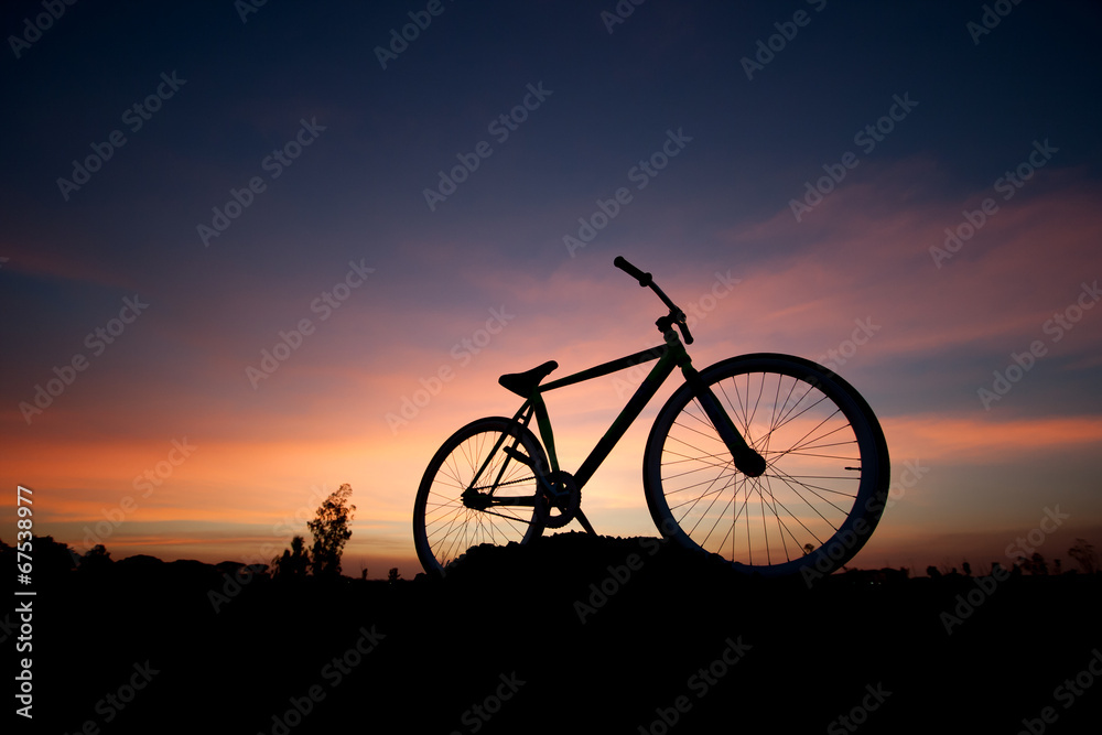 silhouette bicycle in sunset
