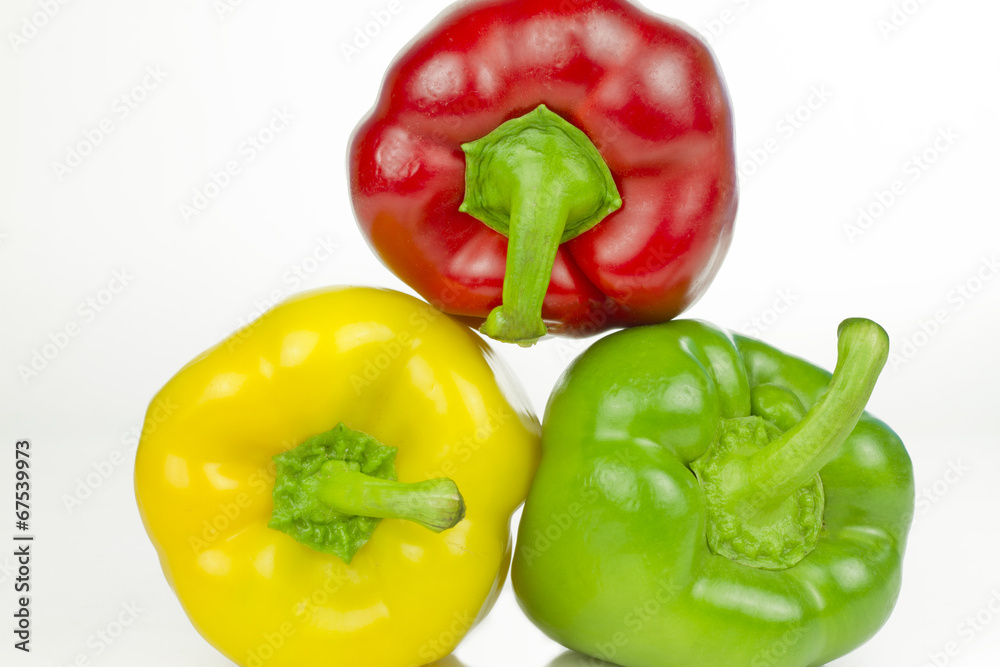 Red, green and yellow peppers