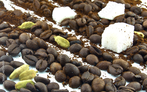 coffee beans, cardamom, lump sugar and ground coffee