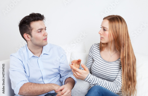 Young man listen to his girlfriend