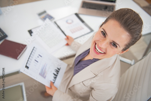Free Download Portrait of happy business woman at work - GFXLoad