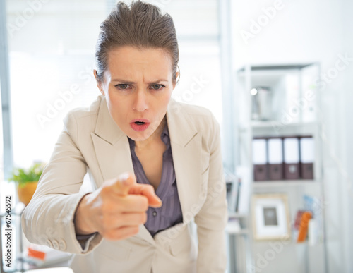Bilde på lerret Angry business woman threatening with finger