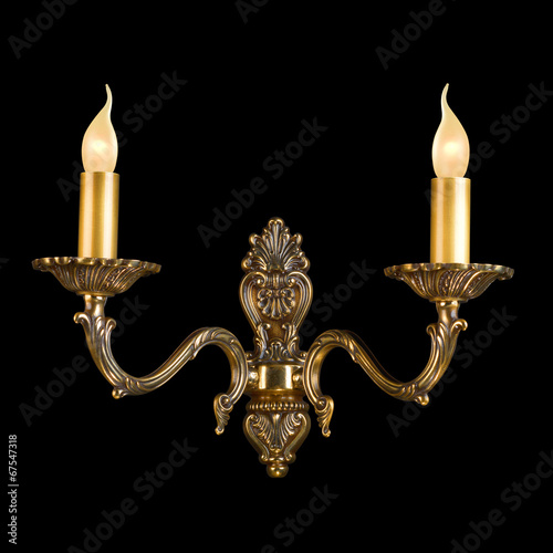 Ornamental vintage wall lamp isolated on black with clipping pat