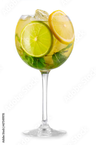 Alcohol cocktail with fresh mint and fruits solated