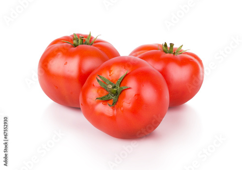 three ripe red tomatoes